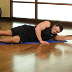 Растяжка спинных мышц лежа на полу на боку